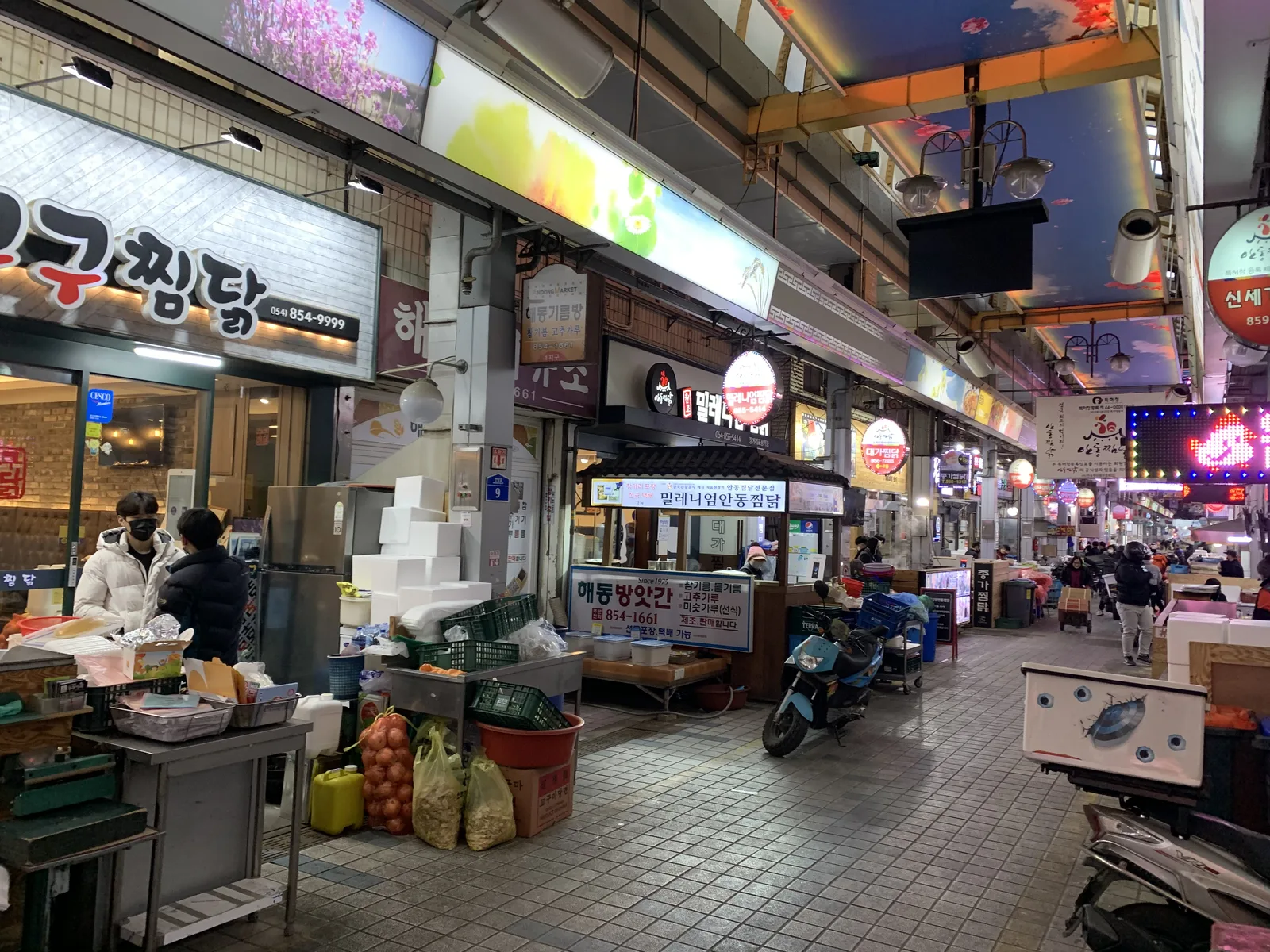 Restaurants and food stalls lining the covered Jjimdak Alley inside Andong Old Market