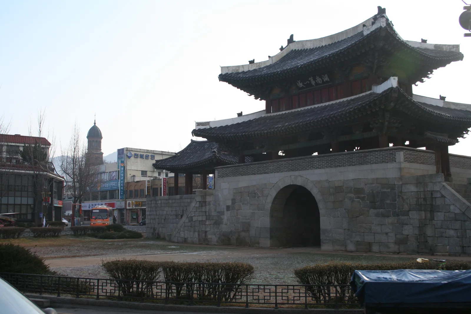 The stone arched base and two-storey timber pavilion of Pungnammun Gate in Jeonju