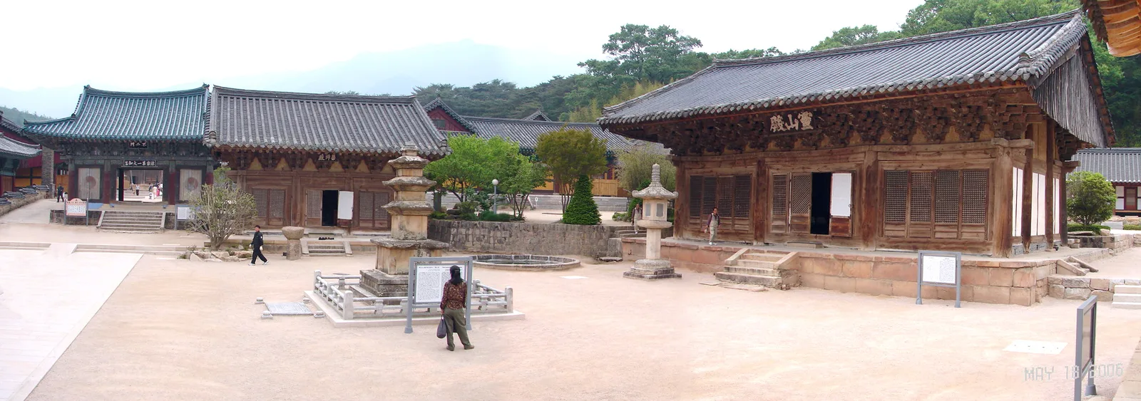 The east courtyard of Tongdosa Temple with traditional halls and a stone pagoda in Yangsan