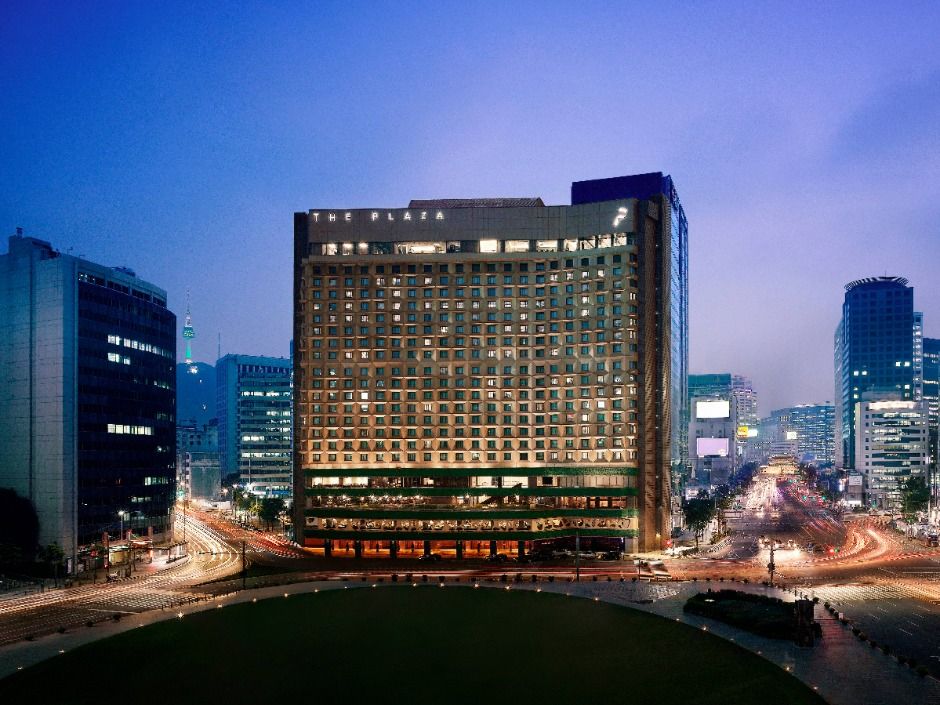 THE PLAZA Seoul hotel illuminated beside Seoul City Hall