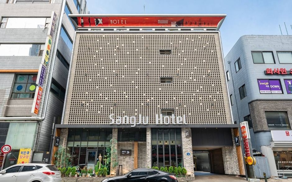 Street facade and signed entrance of Sangju Hotel Jamsil