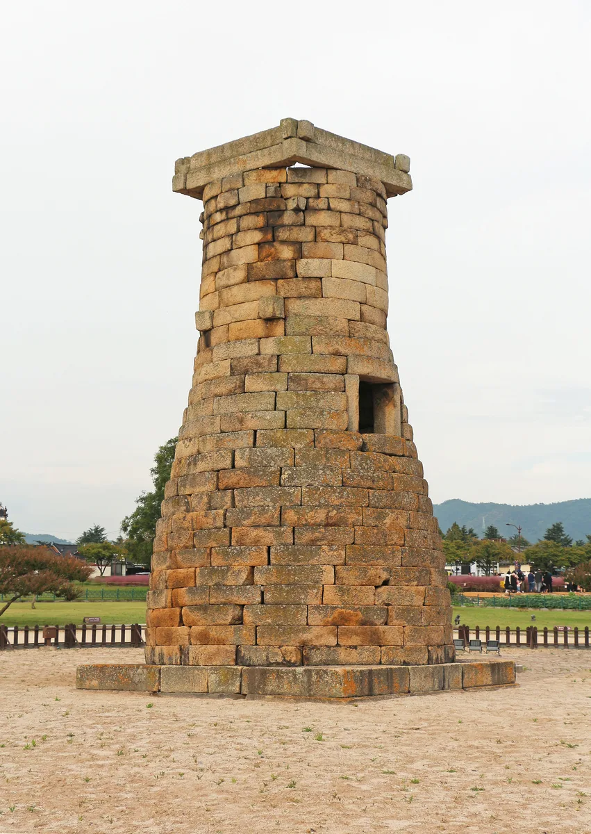 The curved stone tower and square opening of Cheomseongdae Observatory in Gyeongju