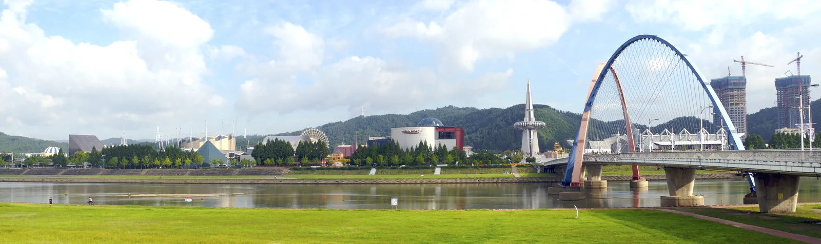 A daytime view across the Gapcheon toward Expo Bridge, Hanbit Tower and the Expo Science Park skyline in Daejeon